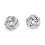 Filigrane Knoten-Ohrstecker aus rhodiniertem 925er Silber mit kleinen, funkelnden Steinen in den Windungen.