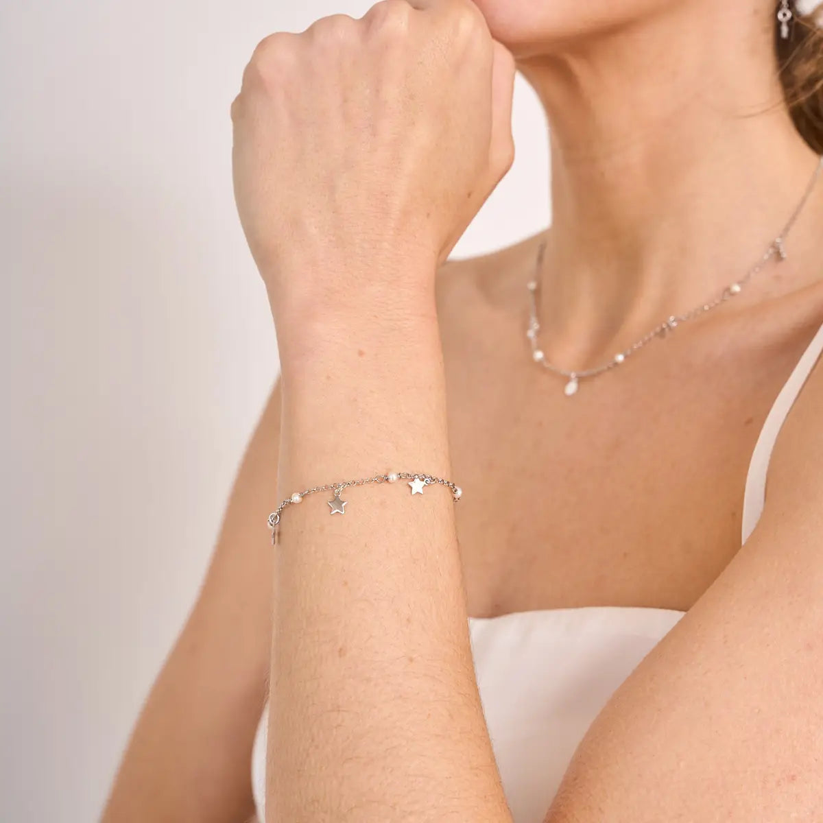 Armband mit Sternen und Perlen